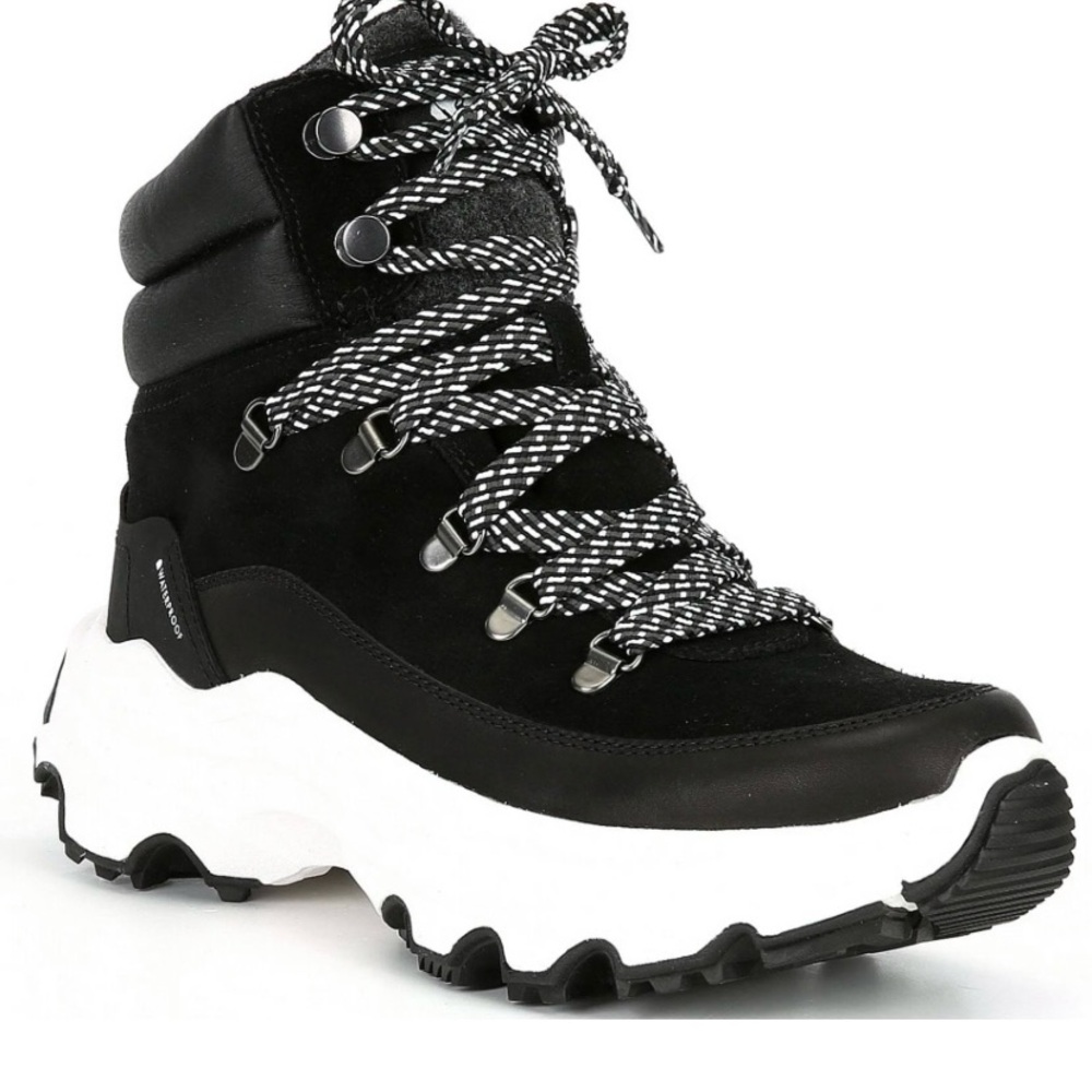 Never worn. Sorel Black and White Athletic Boots